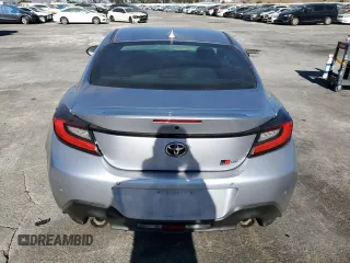 2023 Toyota GR86 with VIN JF1ZNBC1XP8756591, listed as a Copart auction lot 89342485 with 37,686 mi miles and Salvage Title. Bid and sale history available at carsss.com. Image 6.