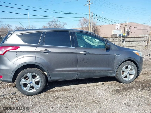 2014 Ford Escape SE with VIN 1FMCU9GX1EUC53011, listed as a IAAI auction lot 41762443 with 140,822 mi miles. Bid and sale history available at carsss.com. Image 13.