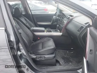 2014 Mazda CX-9 Grand Touring with VIN JM3TB3DV9E0440506, listed as a IAAI auction lot 41537718 with 217,299 mi miles and . Bid and sale history available at DreamBid. Image 5.