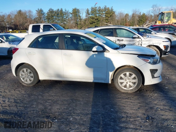 2022 Kia Rio S with VIN 3KPA25AD5NE443465, listed as a IAAI auction lot 41230852 with 20,460 mi miles and . Bid and sale history available at DreamBid. Image 13.