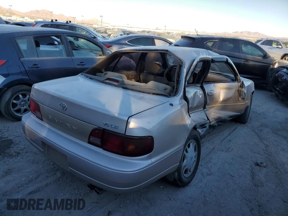 1995 Toyota Camry LE with VIN 4T1GK12E5SU76389, listed as a Copart auction lot 83120474 with 245,875 mi miles and Non Repairable. Bid and sale history available at carsss.com. Image 3.