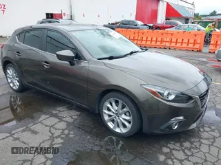 2014 Mazda 3 S Grand Touring with VIN JM1BM1M3XE1164610, listed as a IAAI auction lot 42421946 with 96,591 mi miles and . Bid and sale history available at DreamBid. Image 1.