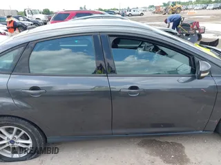 2017 Ford Focus SE with VIN 1FADP3F23HL232809, listed as a IAAI auction lot 42117700 with 104,802 mi miles and . Bid and sale history available at DreamBid. Image 13.