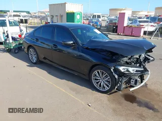 2023 BMW 3 Series 330i with VIN 3MW69FF06P8D71252, listed as a IAAI auction lot 41916329 with 302 mi miles. Bid and sale history available at carsss.com. Image 1.