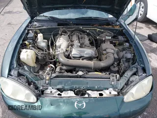 2002 Mazda MX-5 Miata Cloth z VIN JM1NB353720222073, wystawiony jako IAAI lot #42225042 z przebiegiem 94 992 mil mil oraz . Historia ofert i sprzedaży dostępna na DreamBid. Obrazek 10.
