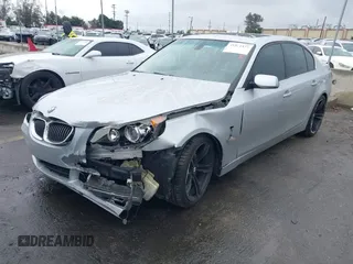 2007 BMW 5 Series 530i with VIN WBANE73507CM46579, listed as a IAAI auction lot 41511577 with 168,904 mi miles. Bid and sale history available at carsss.com. Image 2.