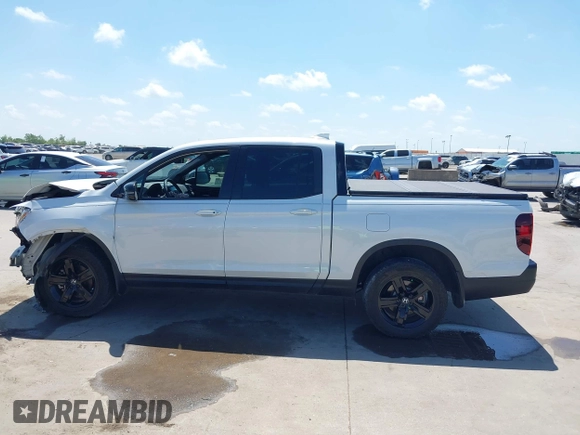 2023 Honda Ridgeline Black Edition with VIN 5FPYK3F8XPB009920, listed as a IAAI auction lot 42086798 with 37,192 mi miles and . Bid and sale history available at DreamBid. Image 14.
