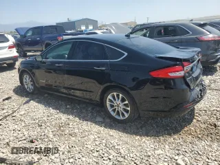 2017 Ford Fusion Hybrid SE with VIN 3FA6P0LU1HR266939, listed as a Copart auction lot 61018305 with 121,293 mi miles and Salvage title. Bid and sale history available at DreamBid. Image 2.