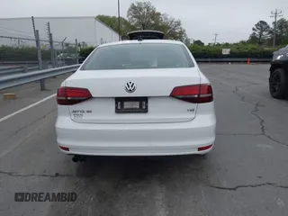 2016 Volkswagen Jetta Sedan 1.4T SE with VIN 3VWD67AJ6GM260584, listed as a IAAI auction lot 41903048 with 104,876 mi miles. Bid and sale history available at carsss.com. Image 16.