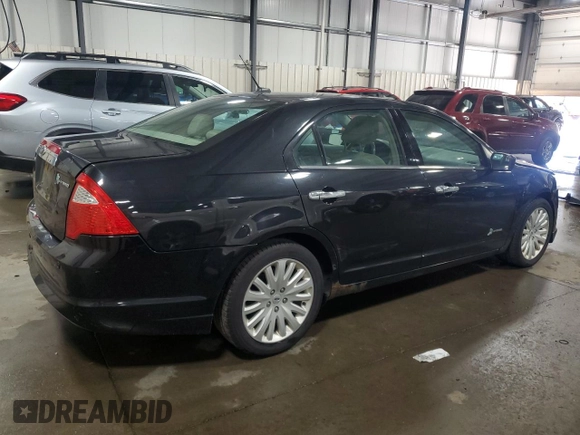 2012 Ford Fusion Hybrid с VIN 3FADP0L33CR231536, выставлен на аукционе Copart как лот 55330545 с пробегом 165 481 миль миль и Списание • Salvage title. История ставок и продаж доступна на DreamBid. Изображение 3.