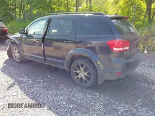 2013 Dodge Journey R/T with VIN 3C4PDDEG4DT691056, listed as a IAAI auction lot 42535196 with 198,307 mi miles and . Bid and sale history available at DreamBid. Image 3.