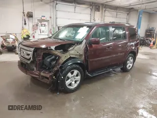2011 Honda Pilot EX-L with VIN 5FNYF4H56BB051404, listed as a IAAI auction lot 41758332 with 301,099 mi miles. Bid and sale history available at carsss.com. Image 18.