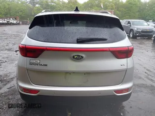 2018 Kia Sportage EX z VIN KNDPNCAC8J7309766, wystawiony jako IAAI lot #42219243 z przebiegiem 90 745 mil mil oraz . Historia ofert i sprzedaży dostępna na DreamBid. Obrazek 16.
