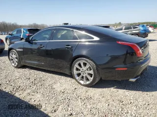 2012 Jaguar XJ with VIN SAJWA1CB5CLV29023, listed as a Copart auction lot 48300165 with 42,725 mi miles and Salvage title. Bid and sale history available at DreamBid. Image 2.
