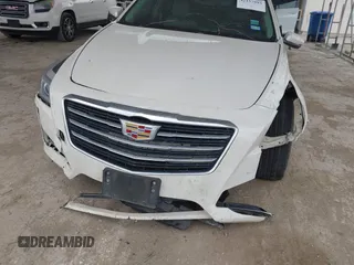 2014 Cadillac CTS RWD z VIN 1G6AP5SXXE0182114, wystawiony jako IAAI lot #42157993 z przebiegiem 132 507 mil mil oraz . Historia ofert i sprzedaży dostępna na DreamBid. Obrazek 6.
