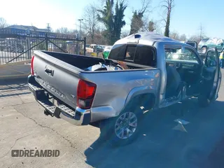 2018 Toyota Tacoma SR with VIN 3TMCZ5AN9JM127113, listed as a IAAI auction lot 41400379 with 12,660 mi miles. Bid and sale history available at carsss.com. Image 4.