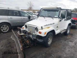 1997 Jeep Wrangler Sahara with VIN 1J4FY49S1VP503639, listed as a IAAI auction lot 41708134 with 102,196 mi miles and . Bid and sale history available at carsss.com. Image 2.
