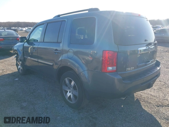 2012 Honda Pilot Touring with VIN 5FNYF3H9XCB042090, listed as a IAAI auction lot 41751359 with 140,424 mi miles and . Bid and sale history available at carsss.com. Image 3.