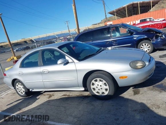 1999 Mercury Sable GS with VIN 1MEFM50U1XA612306, listed as a IAAI auction lot 41745776 with 111,311 mi miles. Bid and sale history available at carsss.com. Image 13.