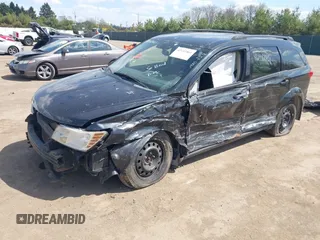 2011 Dodge Journey Mainstreet with VIN 3D4PH1FG2BT516953, listed as a IAAI auction lot 42112461 with 203,909 mi miles and . Bid and sale history available at DreamBid. Image 2.