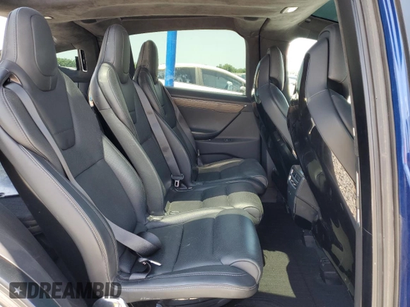 2016 Tesla Model X 70D z VIN 5YJXCAE29GF001522, wystawiony jako Copart lot #56571115 z przebiegiem 129 924 mil mil oraz Szkody całkowita. Historia ofert i sprzedaży dostępna na DreamBid. Obrazek 10.