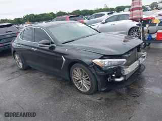 2021 Genesis G70 2.0T with VIN KMTG64LA8MU067129, listed as a IAAI auction lot 41364886 with 48,043 mi miles. Bid and sale history available at carsss.com. Image 1.