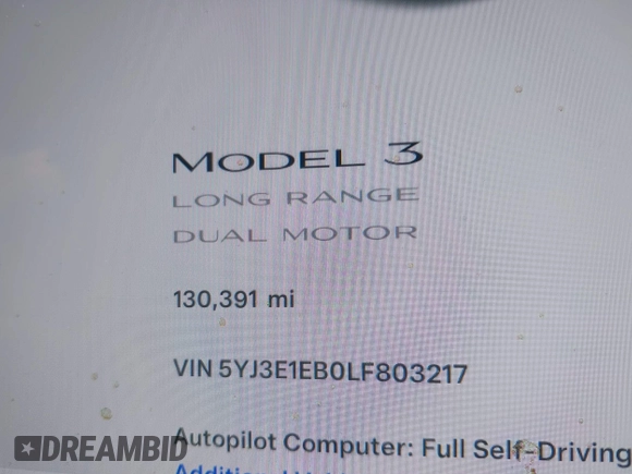 2020 Tesla Model 3 Long Range with VIN 5YJ3E1EB0LF803217, listed as a IAAI auction lot 41871940 with 130,391 mi miles. Bid and sale history available at carsss.com. Image 15.