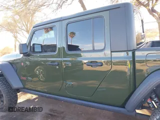 2021 Jeep Gladiator Mojave with VIN 1C6JJTEG8ML606876, listed as a IAAI auction lot 41632052 with 30,255 mi miles and . Bid and sale history available at DreamBid. Image 14.