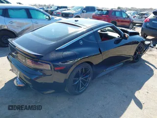 2023 Nissan Z Performance with VIN JN1BZ4BH9PM310761, listed as a IAAI auction lot 41630494 with 6,541 mi miles and . Bid and sale history available at DreamBid. Image 4.