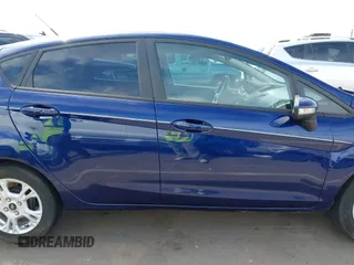 2016 Ford Fiesta SE with VIN 3FADP4EJ4GM199945, listed as a IAAI auction lot 41881260 with 98,945 mi miles. Bid and sale history available at carsss.com. Image 13.