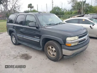 2003 Chevrolet Tahoe LT with VIN 1GNEC13Z93R296379, listed as a IAAI auction lot 41574575 with 301,567 mi miles. Bid and sale history available at carsss.com. Image 1.