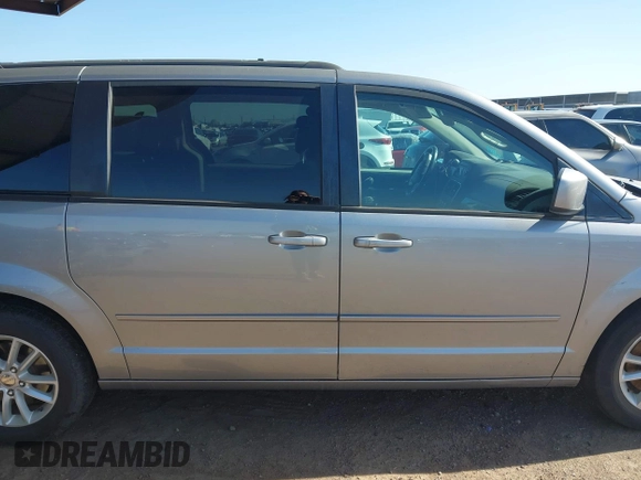 2015 Dodge Grand Caravan SXT with VIN 2C4RDGCG1FR649074, listed as a IAAI auction lot 41759409 with 116,856 mi miles and . Bid and sale history available at DreamBid. Image 14.