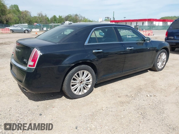 2013 Chrysler 300 with VIN 2C3CCAKG2DH645193, listed as a IAAI auction lot 42105459 with 230,063 mi miles. Bid and sale history available at carsss.com. Image 4.