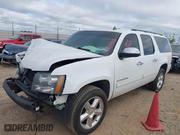 2014 Chevrolet Suburban LT with VIN 1GNSCJE02ER135926, listed as a IAAI auction lot 40675403 with 240,683 mi miles. Bid and sale history available at carsss.com. Image 2.