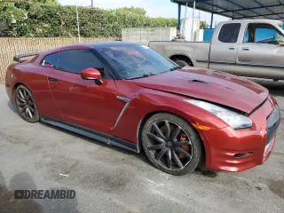 2015 Nissan GT-R Premium z VIN JN1AR5EF9FM280350, wystawiony jako Copart lot #58313634 z przebiegiem 83 387 mil mil oraz Szkody całkowita. Historia ofert i sprzedaży dostępna na DreamBid. Obrazek 4.