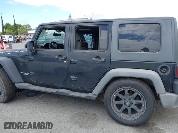 2007 Jeep Wrangler Unlimited X with VIN 1J4GB391X7L172965, listed as a IAAI auction lot 42040337 with 170,482 mi miles and . Bid and sale history available at DreamBid. Image 14.