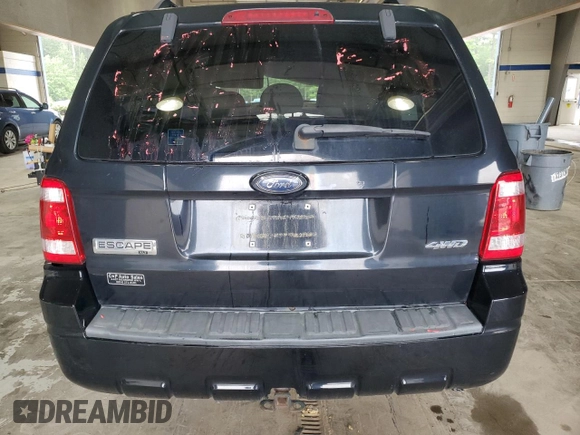 2008 Ford Escape XLT z VIN 1FMCU931X8KE51989, wystawiony jako Copart lot #60494295 z przebiegiem Nie podano mil oraz Szkoda całkowita • Salvage title. Historia ofert i sprzedaży dostępna na DreamBid. Obrazek 6.