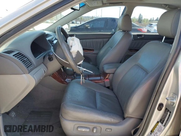 2006 Toyota Camry LE z VIN 4T1BF32K46U113289, wystawiony jako Copart lot #52558135 z przebiegiem 213 000 mil mil oraz Szkoda całkowita • Salvage title. Historia ofert i sprzedaży dostępna na DreamBid. Obrazek 7.
