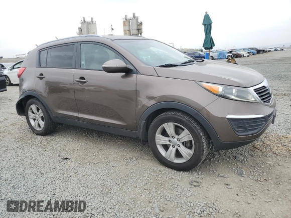 2013 Kia Sportage LX with VIN KNDPB3A20D7511165, listed as a Copart auction lot 52822635 with 190,219 mi miles and Salvage Title. Bid and sale history available at carsss.com. Image 4.