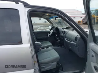 2007 Jeep Liberty Sport with VIN 1J4GL48K77W669788, listed as a IAAI auction lot 41655587 with 136,727 mi miles. Bid and sale history available at carsss.com. Image 5.