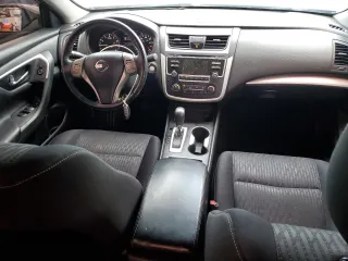 2016 Nissan Altima SL with VIN 1N4AL3AP3GC132595, listed as a Copart auction lot 62811915 with 158,632 mi miles and Salvage title. Bid and sale history available at DreamBid. Image 8.