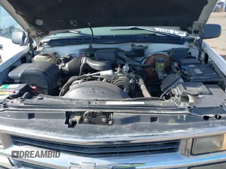 1997 Chevrolet Suburban with VIN 3GNFK16R4VG126095, listed as a IAAI auction lot 41548470 with 290,502 mi miles. Bid and sale history available at carsss.com. Image 10.