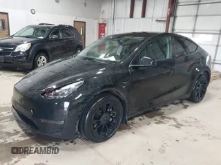 2023 Tesla Model Y Long Range with VIN 7SAYGDEE2PF808844, listed as a IAAI auction lot 41941905 with 39,951 mi miles and . Bid and sale history available at carsss.com. Image 20.