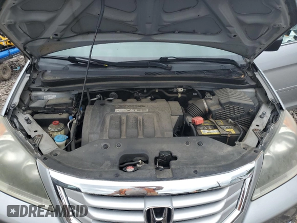 2010 Honda Odyssey LX with VIN 5FNRL3H2XAB059078, listed as a Copart auction lot 61144895 with 116,724 mi miles and Salvage title. Bid and sale history available at DreamBid. Image 11.