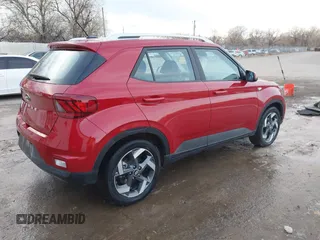 2023 Hyundai Venue SEL with VIN KMHRC8A35PU220898, listed as a IAAI auction lot 40873887 with 24,994 mi miles and . Bid and sale history available at DreamBid. Image 4.