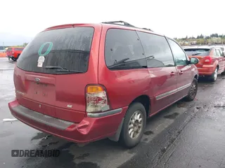 1999 Ford Windstar SE with VIN 2FMZA5244XBA09421, listed as a IAAI auction lot 41973187 with 217,545 mi miles and . Bid and sale history available at DreamBid. Image 4.