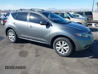 2013 Nissan Murano LE with VIN JN8AZ1MW7DW322852, listed as a IAAI auction lot 41574118 with 128,449 mi miles and . Bid and sale history available at DreamBid. Image 1.