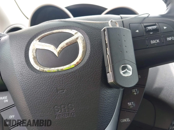2012 Mazda 3 i Touring with VIN JM1BL1L79C1607995, listed as a IAAI auction lot 42254595 with 203,809 mi miles and . Bid and sale history available at DreamBid. Image 11.