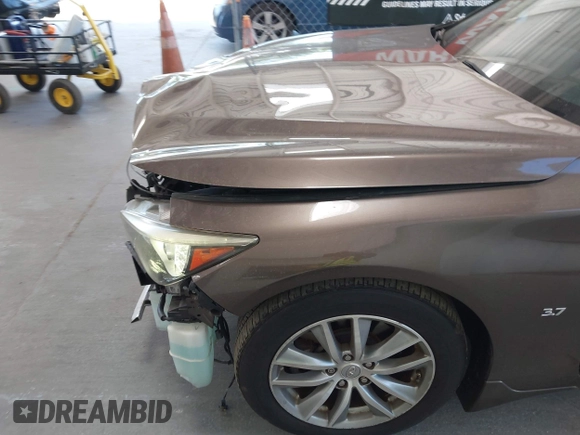 2015 Infiniti Q50 Premium with VIN JN1BV7AP4FM330386, listed as a IAAI auction lot 42028771 with 75,533 mi miles. Bid and sale history available at carsss.com. Image 6.