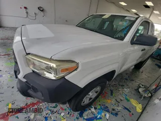 2016 Toyota Tacoma SR with VIN 5TFRX5GN2GX067461, listed as a IAAI auction lot 42731292 with 135,105 mi miles and . Bid and sale history available at DreamBid. Image 4.